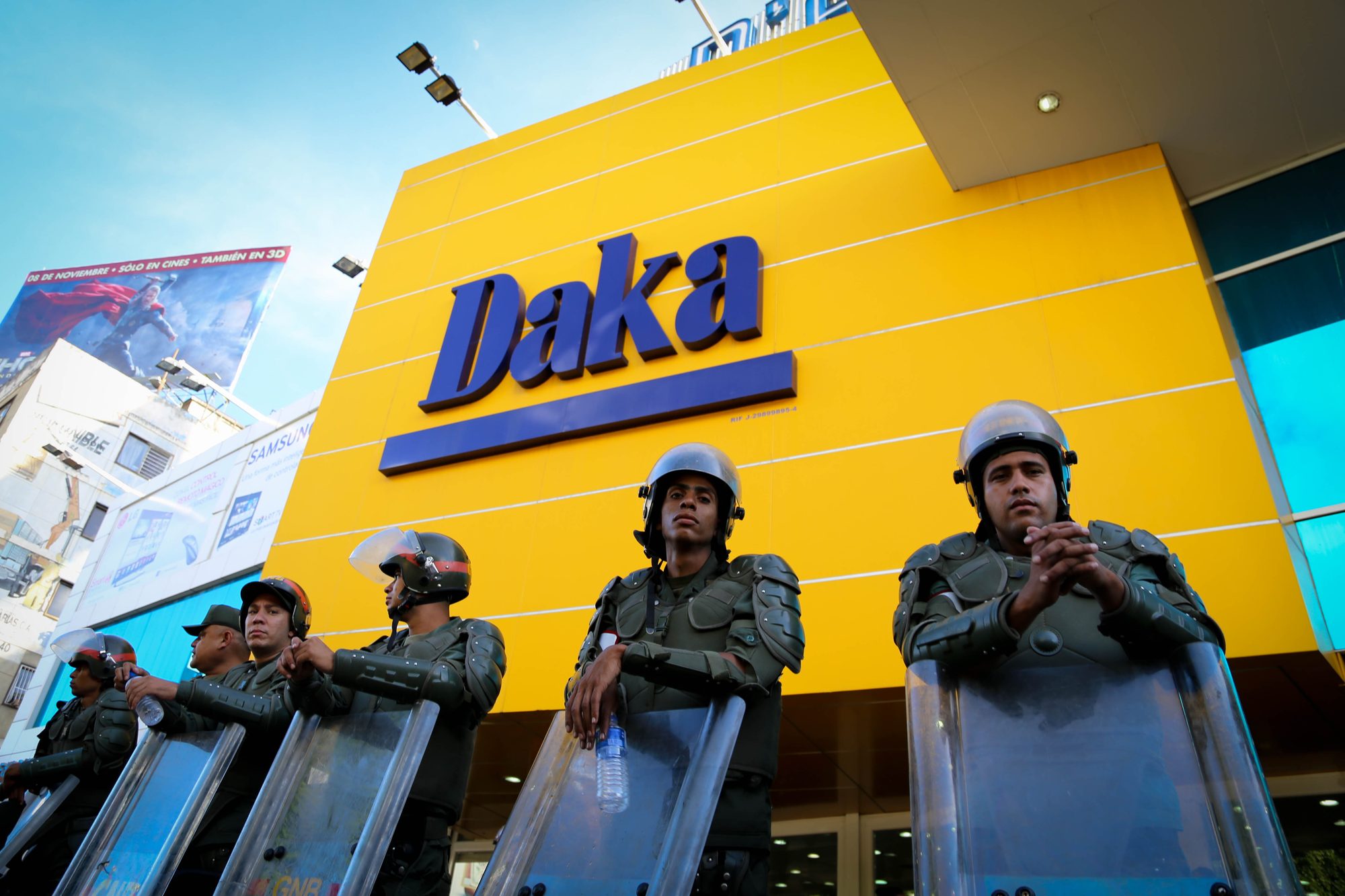 National Guard protect an electronic goods store after the government set strict price constrols.