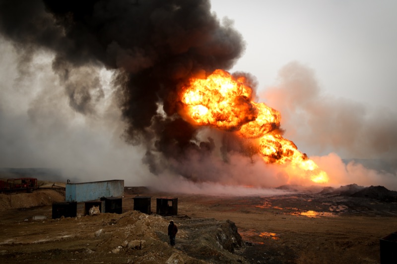 An oil fire lit by Islamic State.